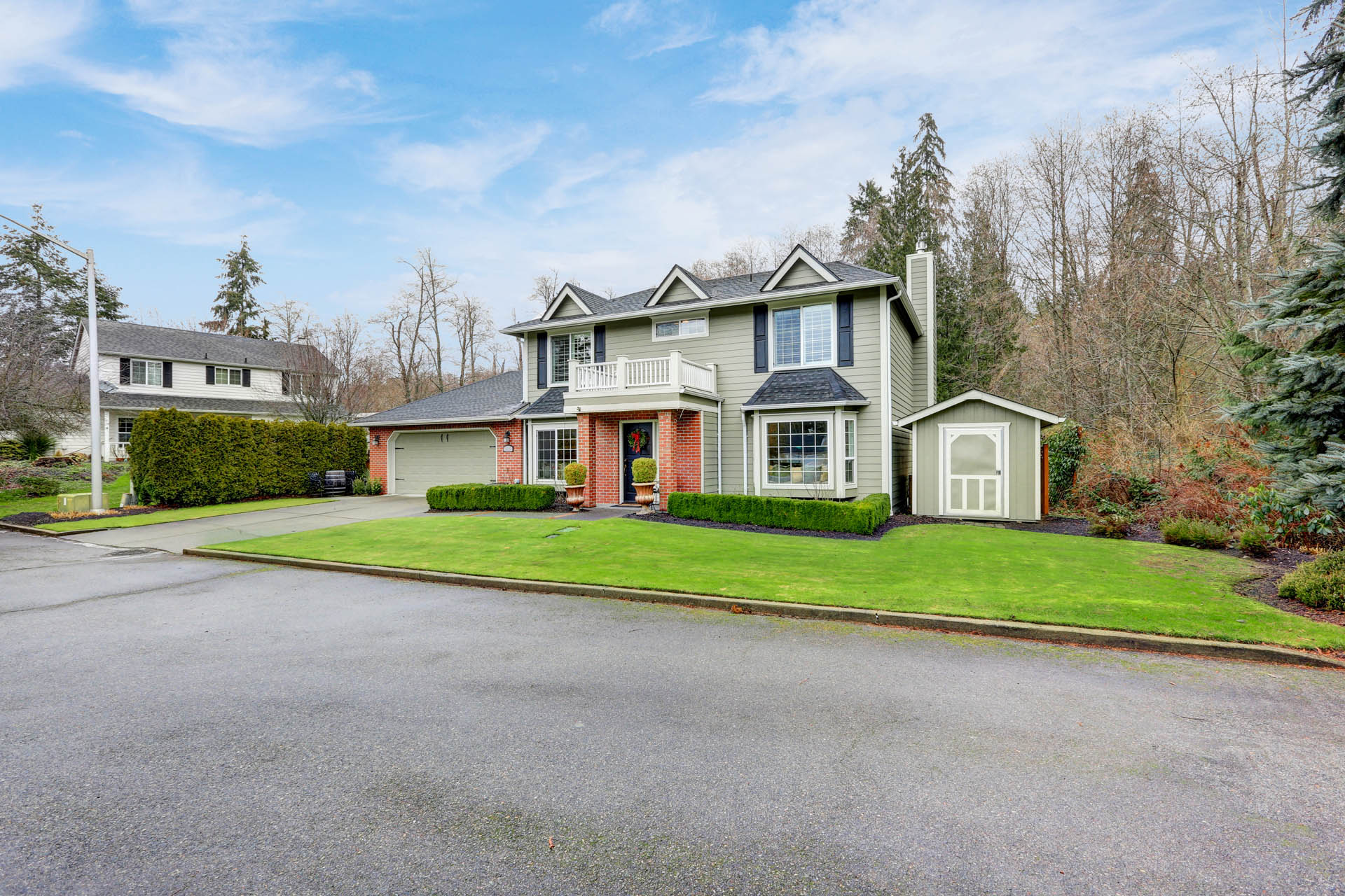 Residential home with new vinyl windows — WindowFixers.ca service area